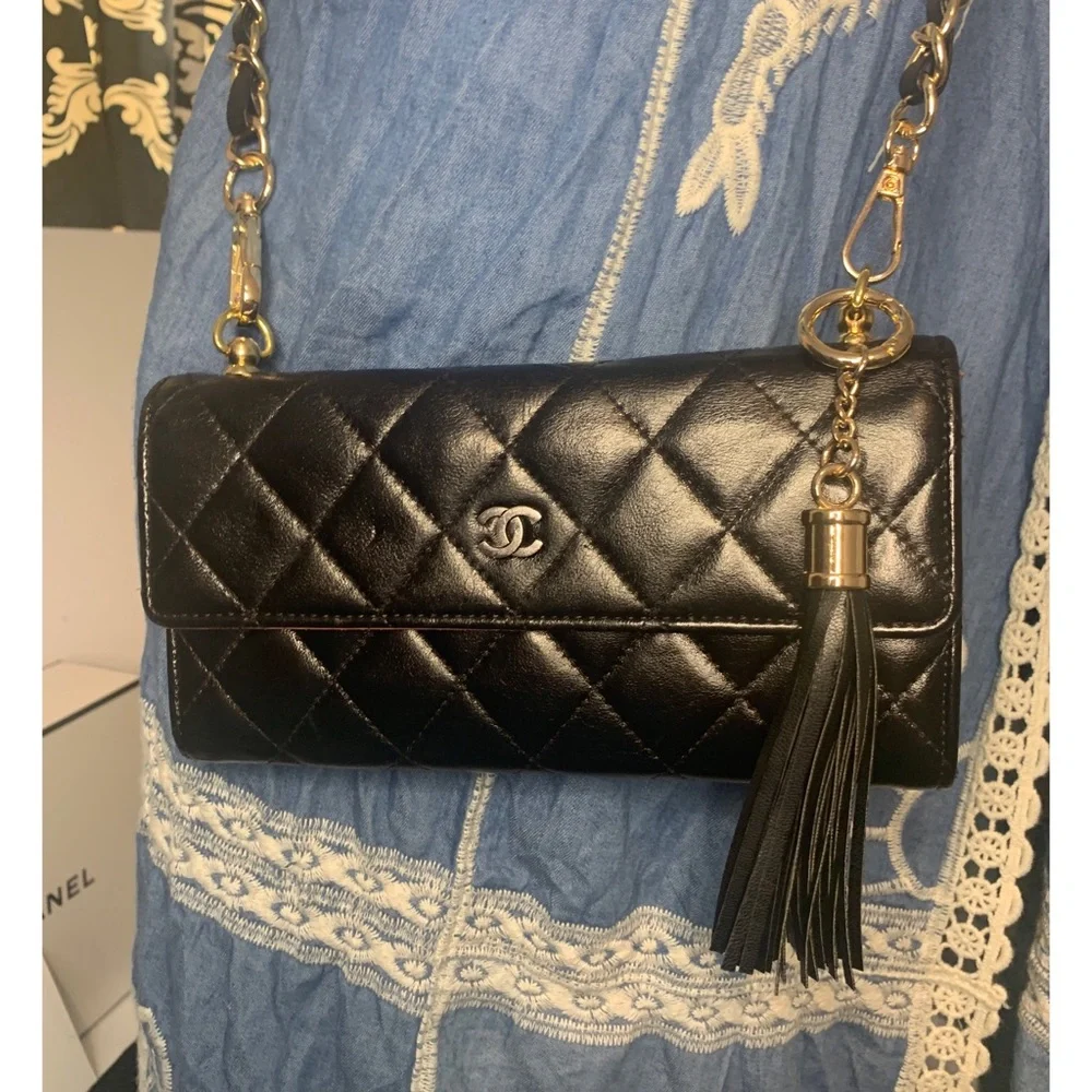 CHANEL Black Quilted Lambskin Crossbody with Gold Chain & Tassel Accent